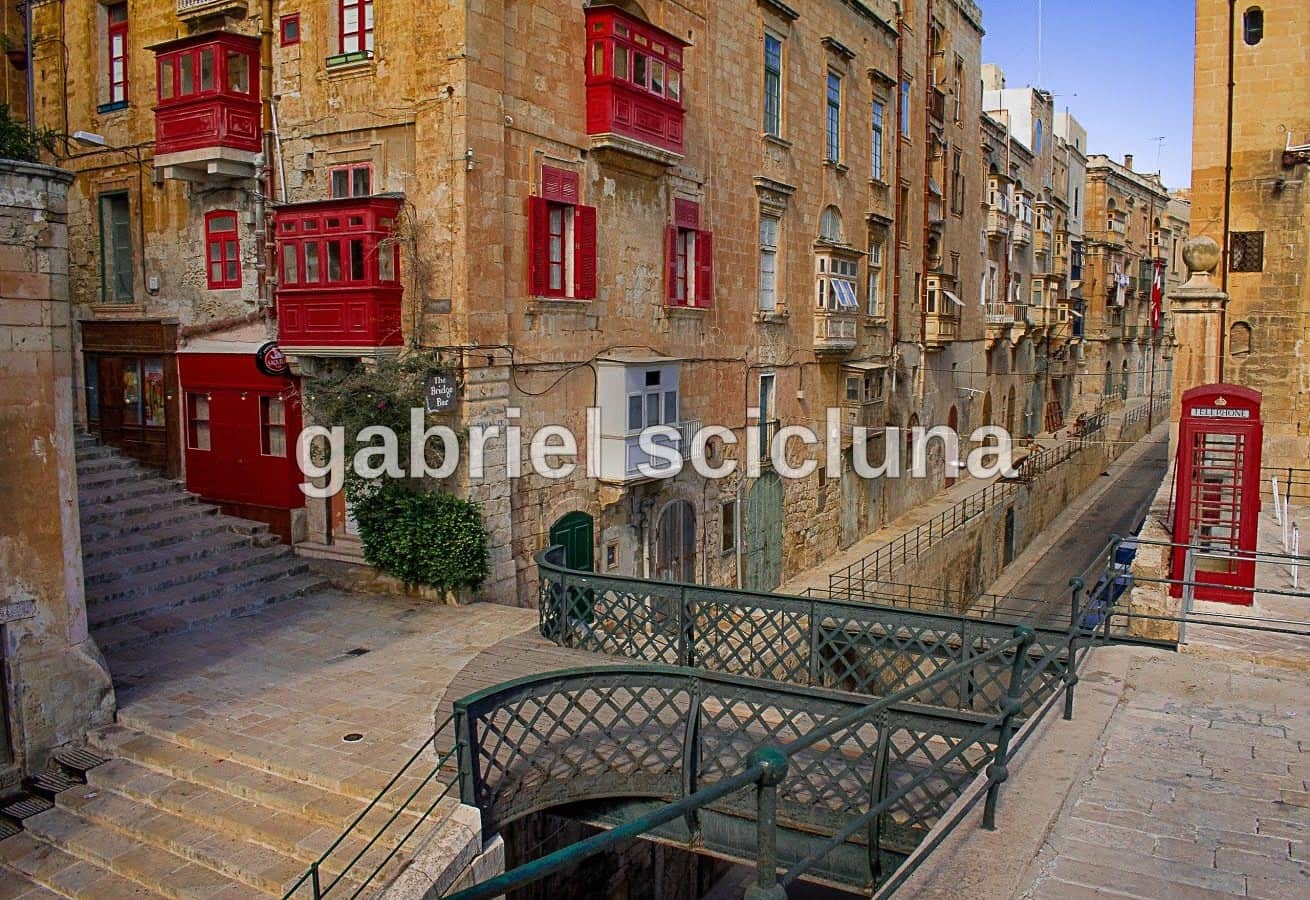 A photographic study of Valletta's traditional buildings and architectural character.