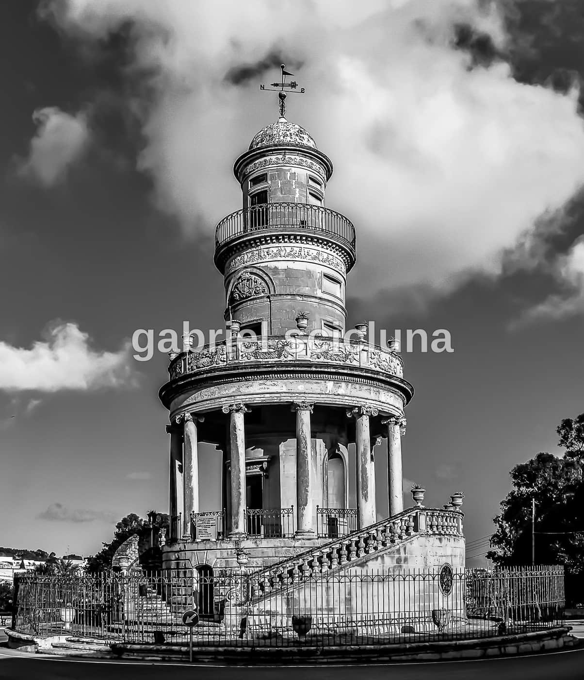 A black-and-white photograph of the Belvedere Tower in Lija.